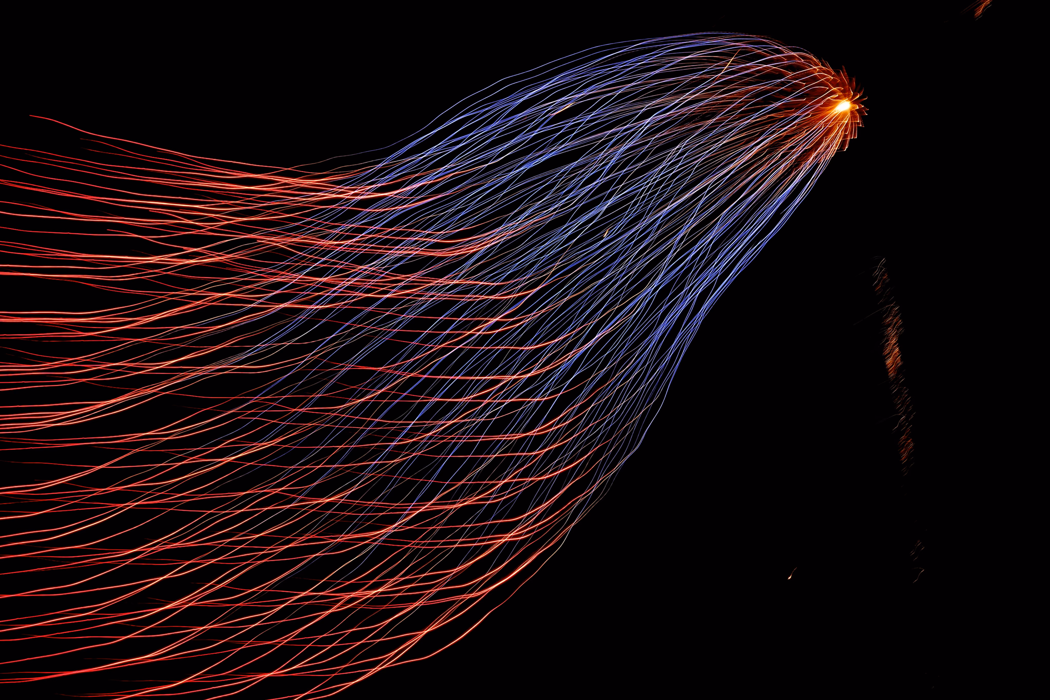 red and blue lights from tower steel wool photography